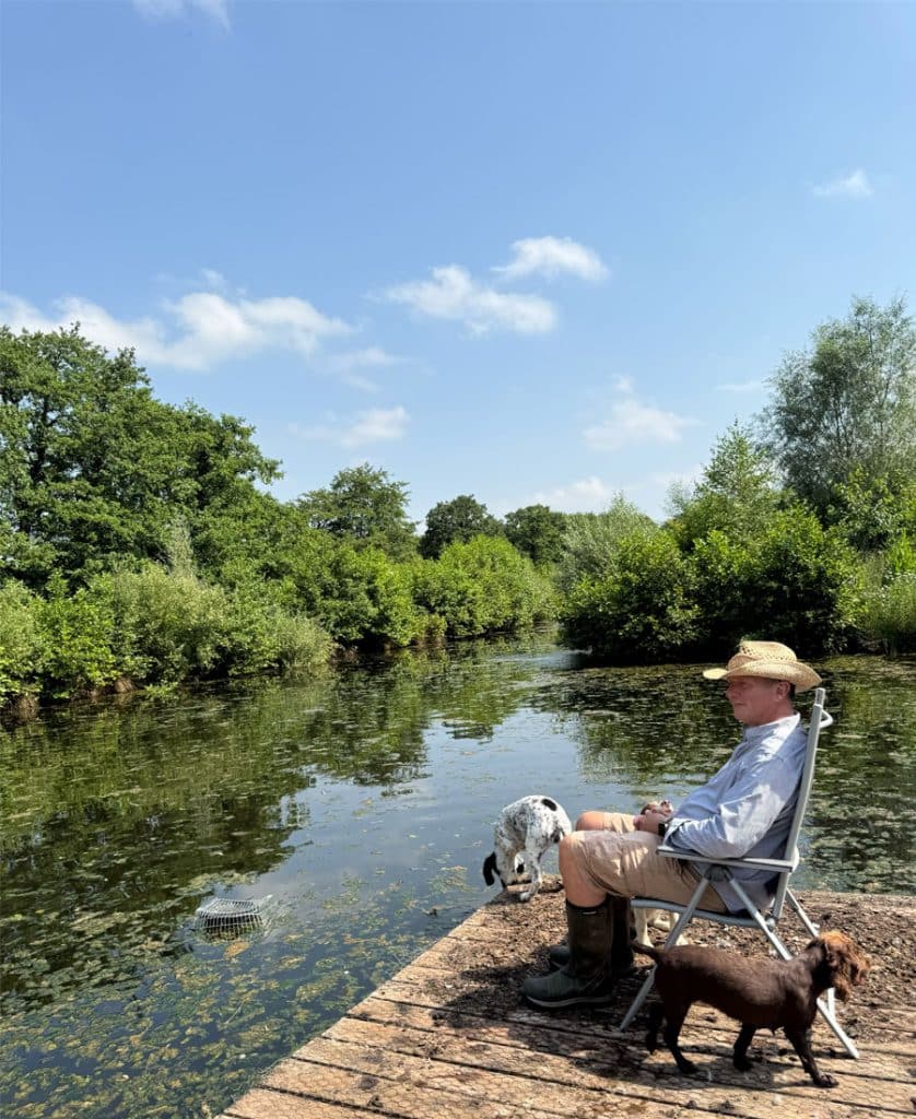 Gift a Tree founder Andy Fields beside the wildlife pond at Bradford Farm
