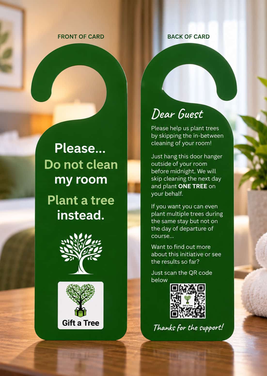 Front and back of the Gift a Tree hotel room door hanger